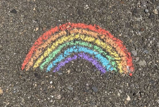 Chalk rainbow on pavement