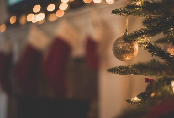 Golden bauble on a Christmas tree